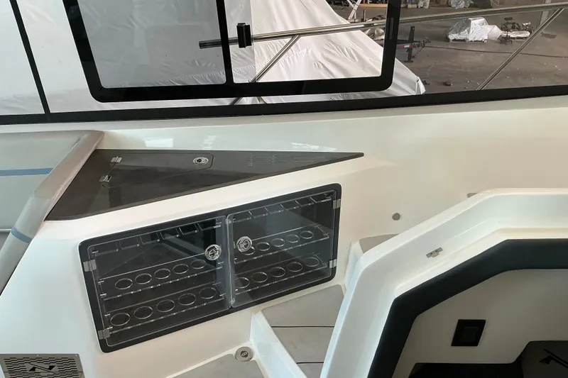 Slide: The Image of Interior view of 2027 NX Boats 41 Horizon, featuring sleek storage compartments. - 20
