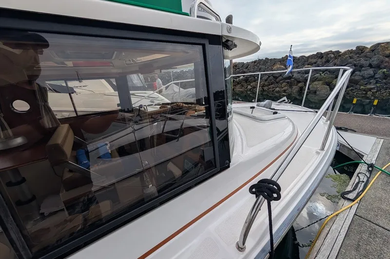 Slide: The Image of 2023 Ranger Tugs boat docked, showcasing sleek design and modern features. - 30