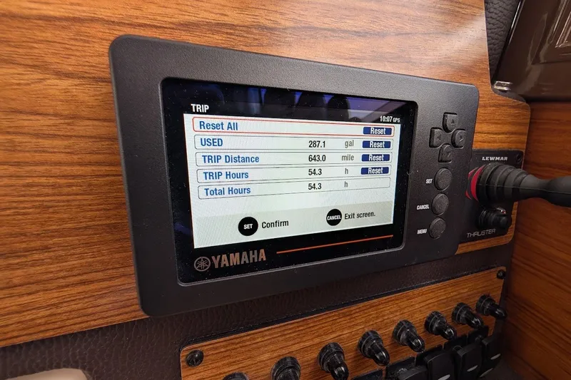 Slide: The Image of Yamaha trip monitor on 2023 Ranger Tugs, displaying fuel usage and trip data. - 38