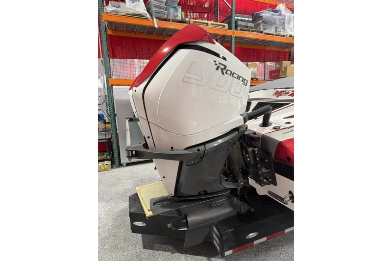 Slide: The Image of 2023 Daves Custom Boats M37R with powerful racing engine in a workshop setting. - 6