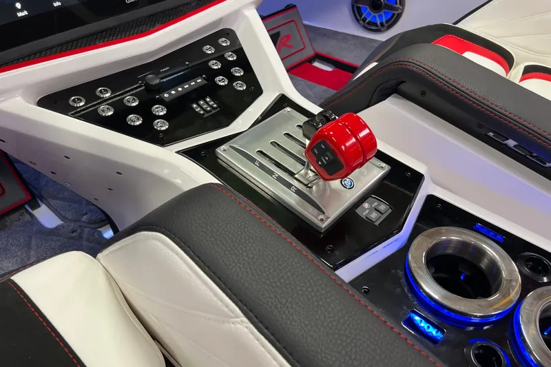 Slide: The Image of Interior of 2023 Daves Custom Boats M37R featuring sleek controls and modern design elements. - 14