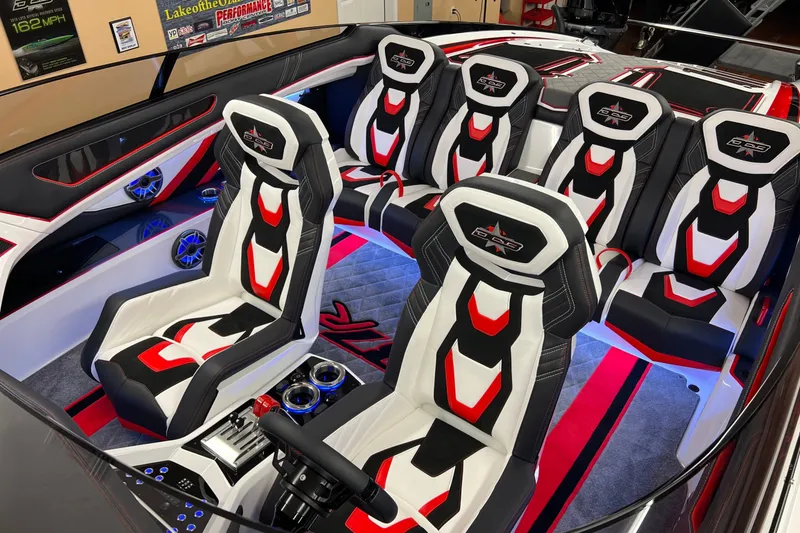 Slide: The Image of Interior of 2023 Daves Custom Boats M37R with stylish black, white, and red seating. - 7
