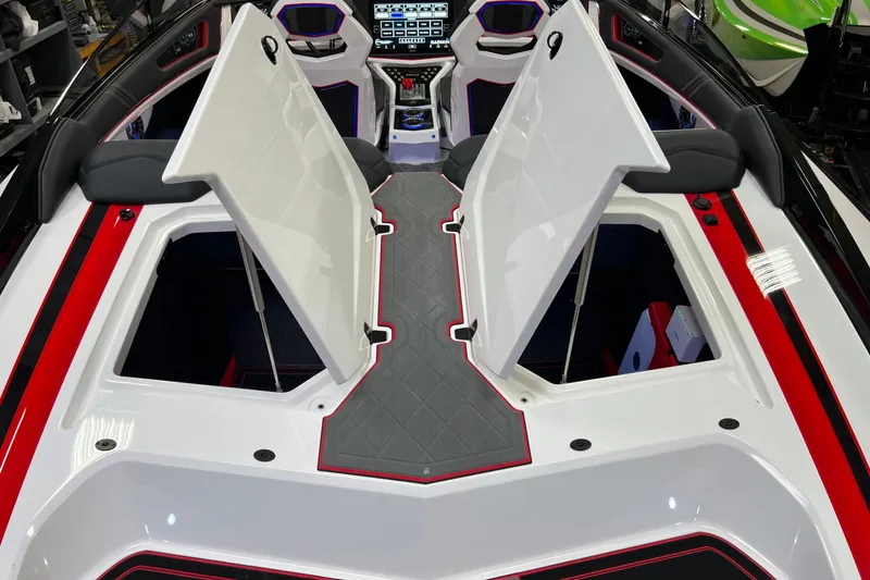 Slide: The Image of 2023 Daves Custom Boats M37R interior with open storage compartments and modern dashboard. - 16