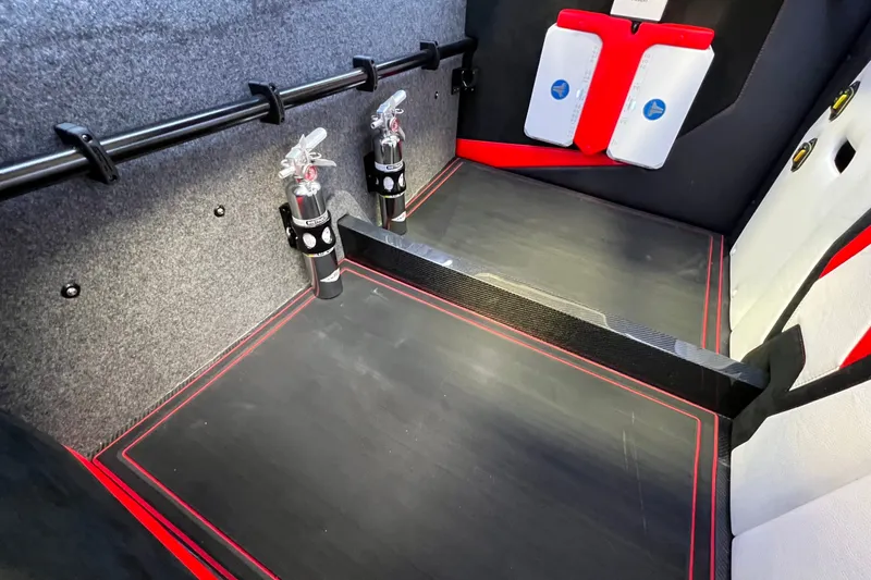 Slide: The Image of Interior of 2023 Daves Custom Boats M37R with fire extinguishers and safety equipment. - 17
