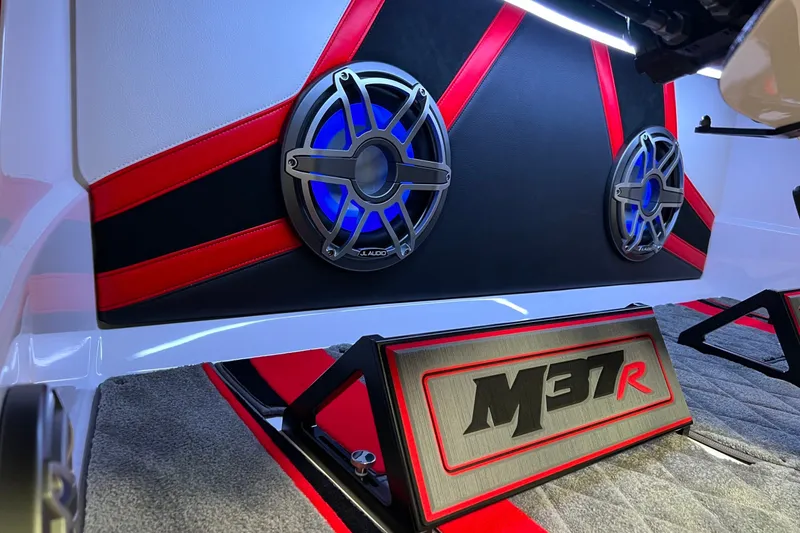 Slide: The Image of 2023 Daves Custom Boats M37R interior with vibrant speakers and stylish design elements. - 13