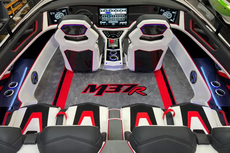 Slide: The Image of 2023 Daves Custom Boats M37R interior with modern dashboard and stylish seating. - 11