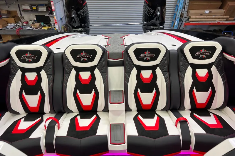 Slide: The Image of 2023 Daves Custom Boats M37R interior with stylish black, white, and red seating design. - 8