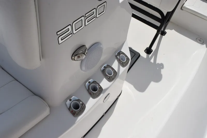 Slide: The Image of 2020 Sportsman Tournament 214 Bay Boat interior with control panel and seating. - 14