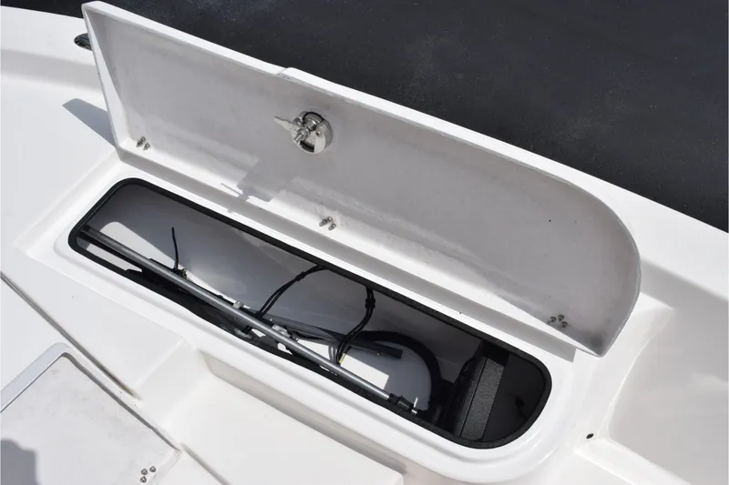 Slide: The Image of Open storage compartment on a 2020 Sportsman Tournament 214 Bay Boat. - 19
