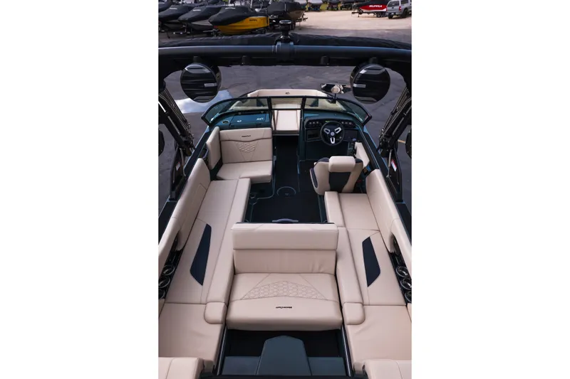 Slide: The Image of Interior view of 2027 MasterCraft NXT24 boat with luxurious beige seating. - 41