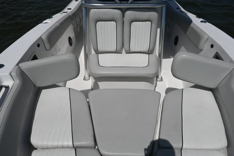 Slide: The Image of 2024 Sea Fox 228 Commander boat interior with cushioned seating and sleek design. - 16