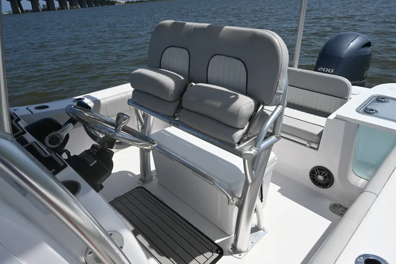 Slide: The Image of 2024 Sea Fox 228 Commander boat interior with helm and seating. - 19