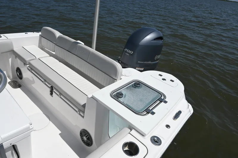 Slide: The Image of 2024 Sea Fox 228 Commander boat interior with Yamaha engine on water. - 22