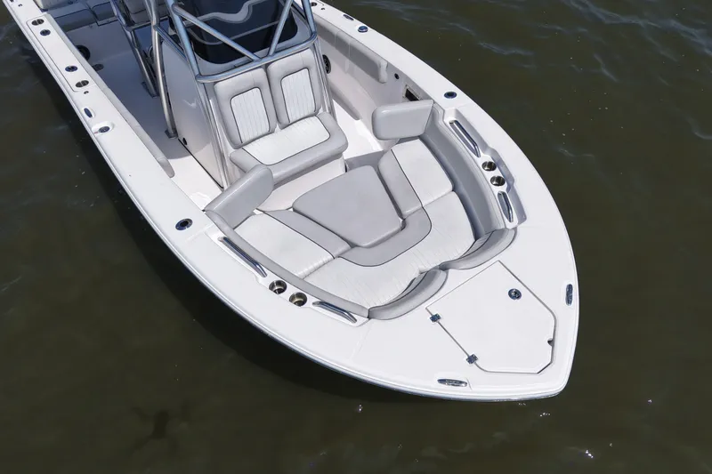 Slide: The Image of The image shows the bow of a 2024 Sea Fox 228 Commander boat with cushioned seating. - 8