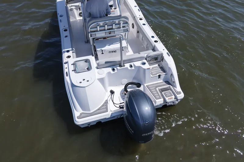 Slide: The Image of The image shows a 2024 Sea Fox 228 Commander boat on the water. - 9