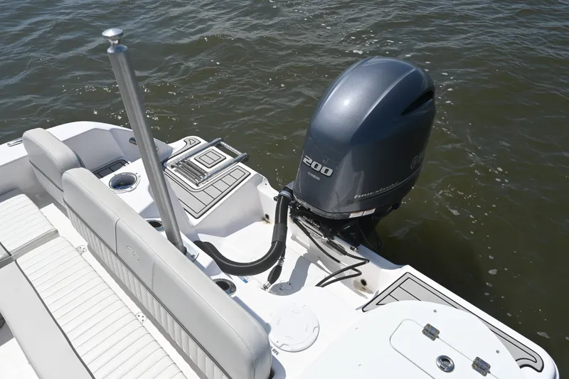 Slide: The Image of 2024 Sea Fox 228 Commander boat with Yamaha 200 outboard motor on water. - 25