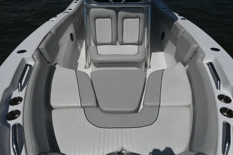 Slide: The Image of 2024 Sea Fox 228 Commander boat interior with cushioned seating and sleek design. - 14