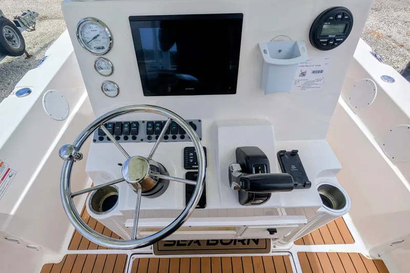 Slide: The Image of 2026 Sea Born LX22 Center Console dashboard with steering wheel and controls. - 20