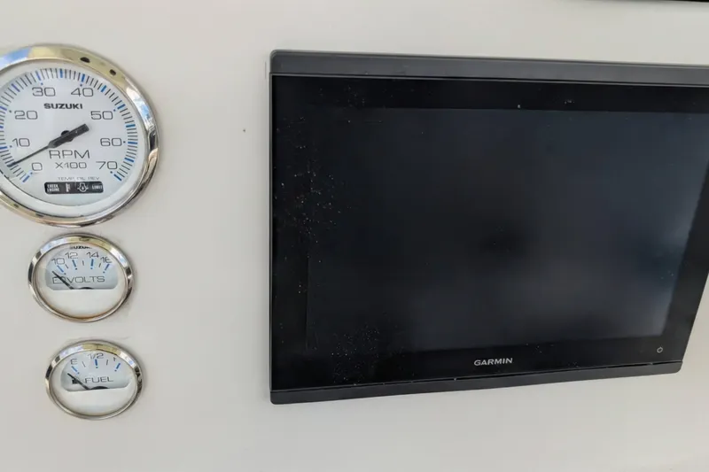 Slide: The Image of Dashboard of 2026 Sea Born LX22 Center Console with gauges and Garmin display. - 18