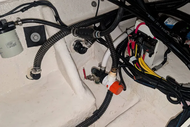 Slide: The Image of Wiring and components inside a 2026 Sea Born LX22 Center Console boat. - 39