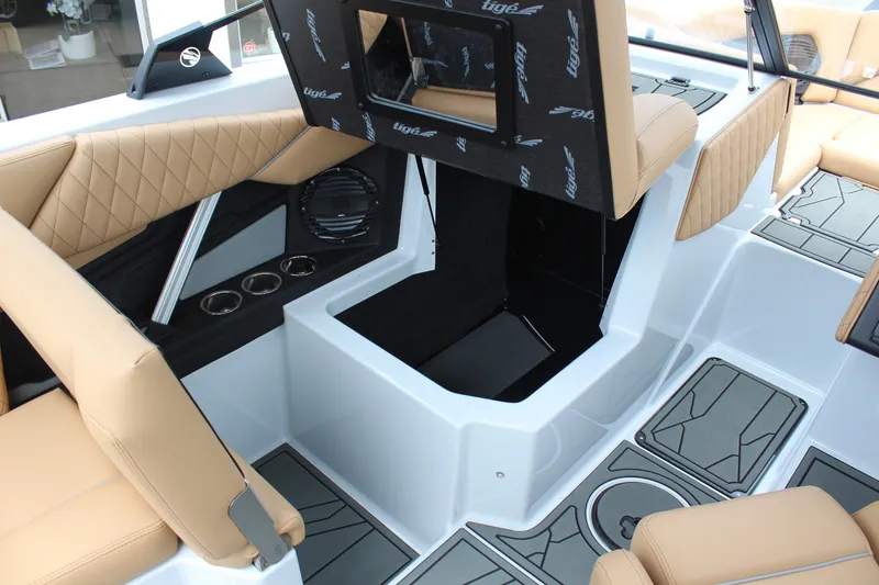 Slide: The Image of Interior of 2027 Tigé Z3 boat with tan seating and modern design elements. - 18