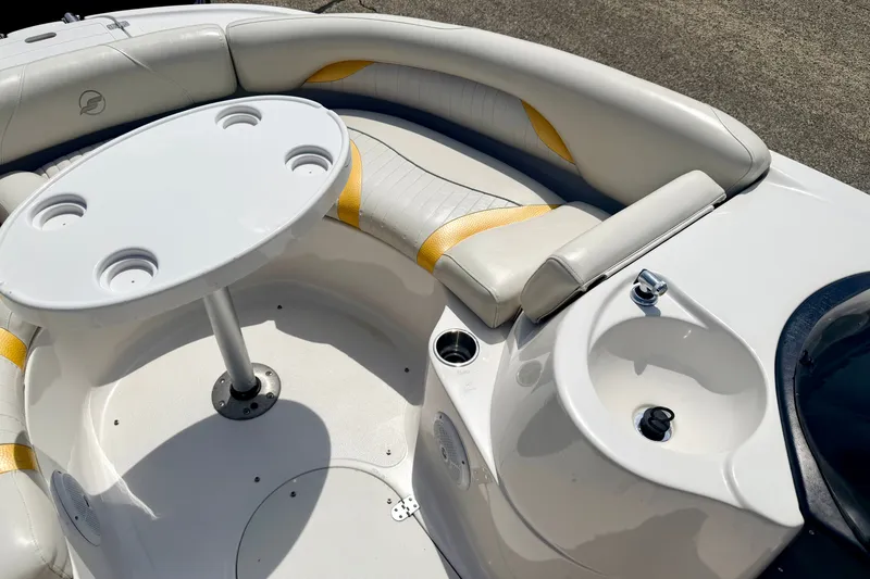 Slide: The Image of 2008 Starcraft Aurora Star Step 190 IO boat interior with seating and table. - 79