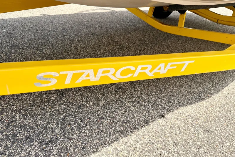 Slide: The Image of Yellow Starcraft trailer frame for 2008 Aurora Star Step 190 IO boat. - 83