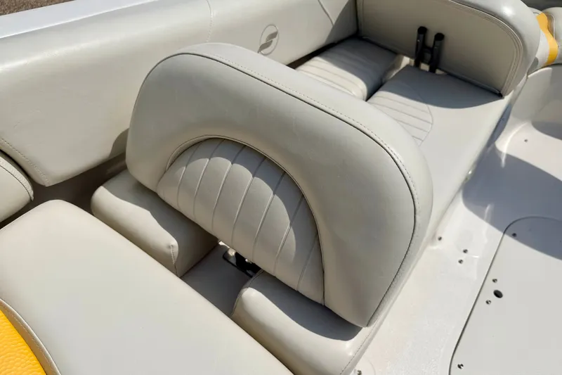 Slide: The Image of 2008 Starcraft Aurora Star Step 190 IO boat interior with white leather seating. - 38