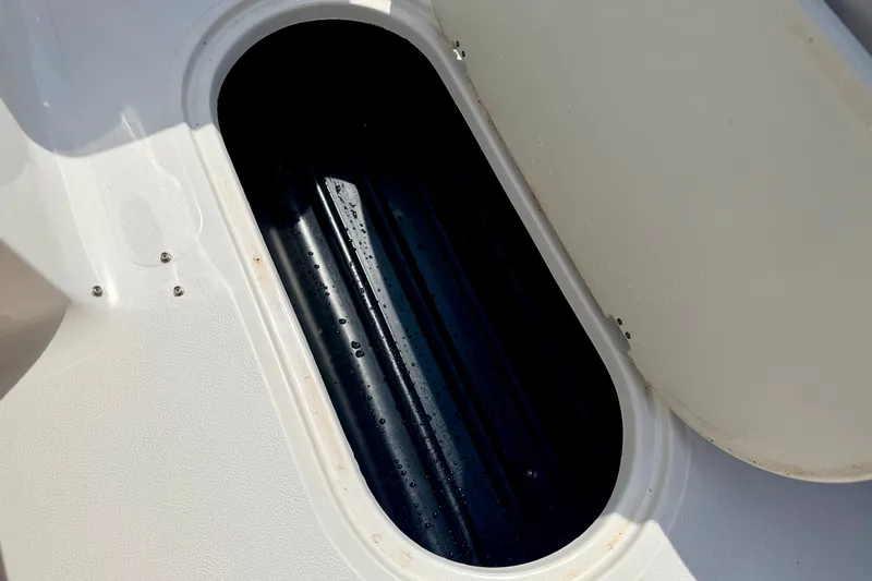 Slide: The Image of Storage compartment of 2008 Starcraft Aurora Star Step 190 IO boat, showing interior details. - 76