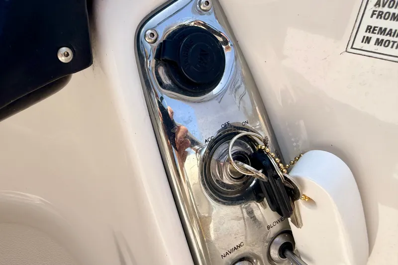 Slide: The Image of Close-up of ignition panel with keys in a 2008 Starcraft Aurora Star Step 190 IO boat. - 61