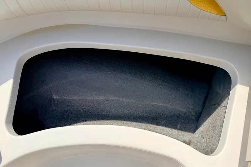 Slide: The Image of 2008 Starcraft Aurora Star Step 190 IO boat storage compartment, interior view. - 47