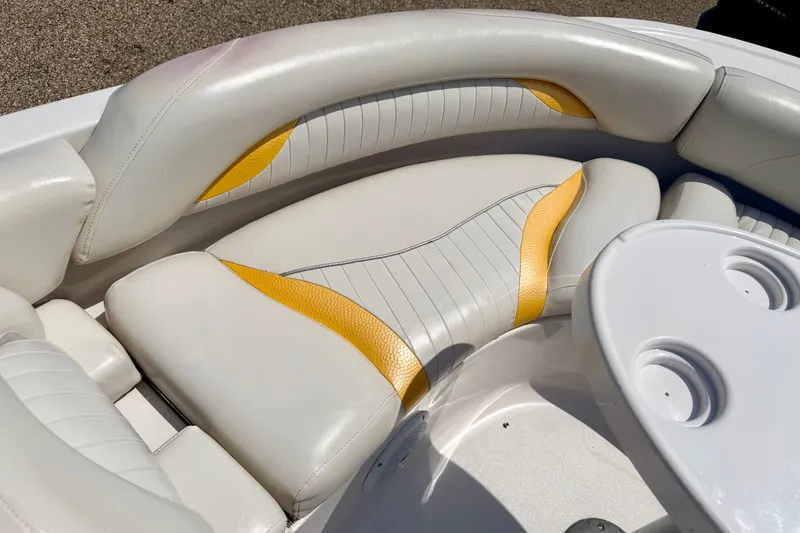 Slide: The Image of 2008 Starcraft Aurora Star Step 190 IO boat interior with white and yellow seating. - 44