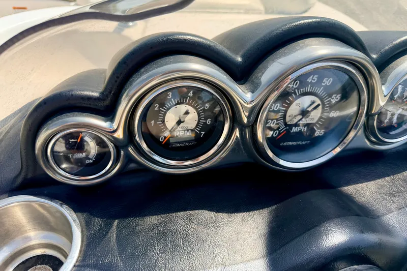 Slide: The Image of Dashboard of 2008 Starcraft Aurora Star Step 190 IO boat with gauges. - 55