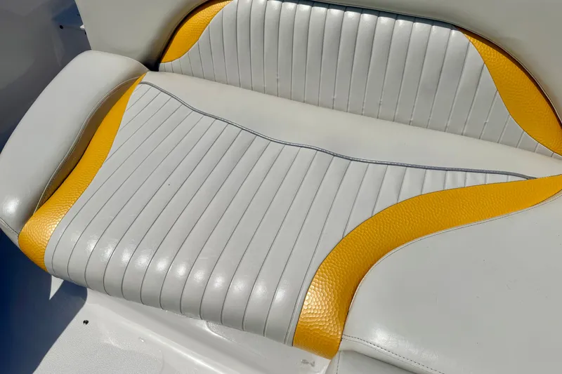 Slide: The Image of White and yellow boat seat from 2008 Starcraft Aurora Star Step 190 IO. - 34