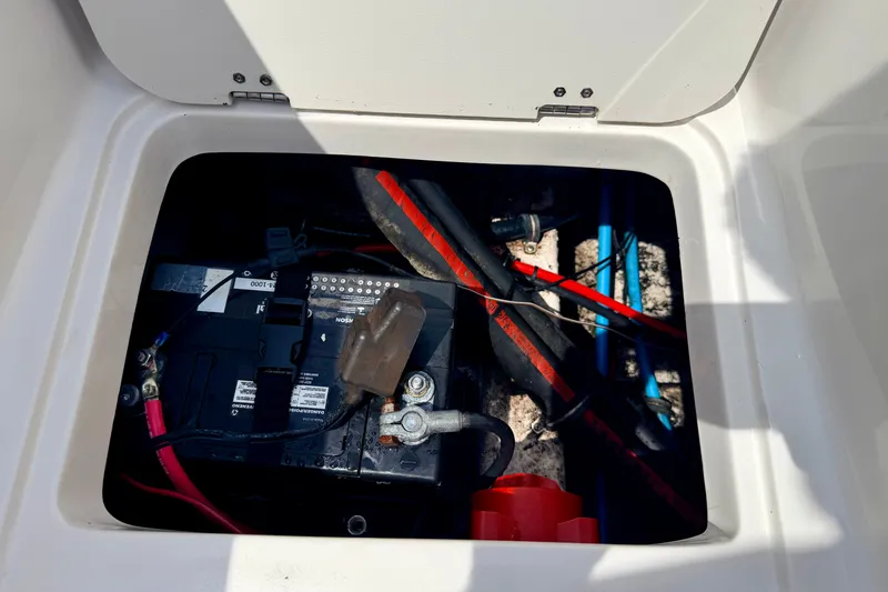 Slide: The Image of Battery compartment of 2008 Starcraft Aurora Star Step 190 IO boat. - 29