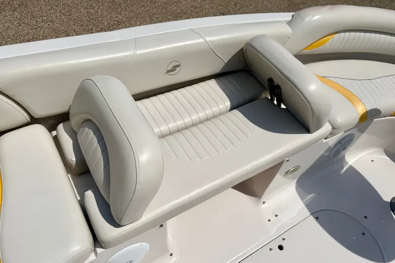 Slide: The Image of 2008 Starcraft Aurora Star Step 190 IO boat interior with beige seating. - 42
