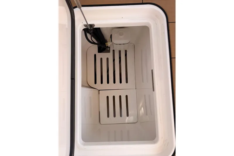 Slide: The Image of Interior view of Aviara AV32 I/O 2022 cooler compartment with slotted shelves. - 50