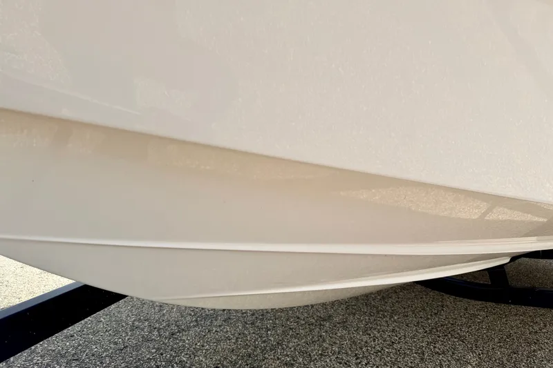 Slide: The Image of Close-up of 2014 Four Winns H200 boat hull on a trailer. - 86
