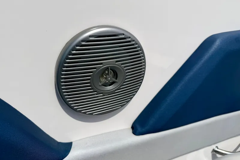 Slide: The Image of Close-up of a speaker on a 2014 Four Winns H200 boat, featuring sleek design elements. - 60
