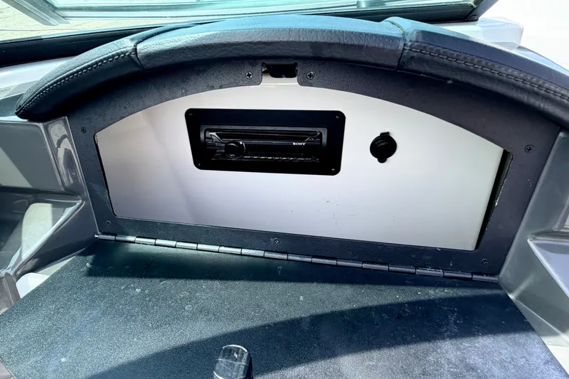 Slide: The Image of 2014 Four Winns H200 boat dashboard with Sony stereo system. - 47