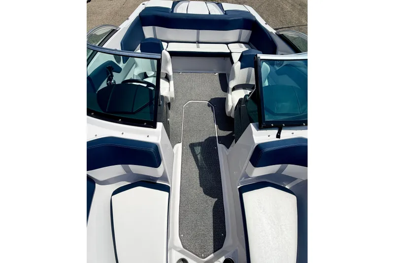 Slide: The Image of Interior view of 2014 Four Winns H200 boat with blue and white seating. - 73