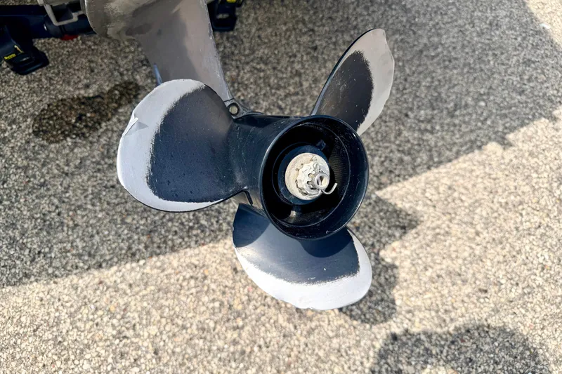 Slide: The Image of Propeller of a 2014 Four Winns H200 boat on a textured surface. - 20