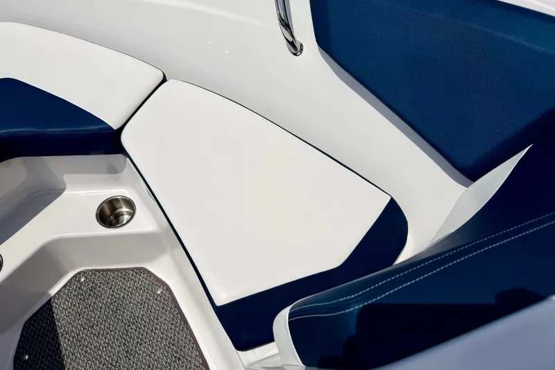 Slide: The Image of Interior seating of 2014 Four Winns H200 boat with blue and white upholstery. - 71