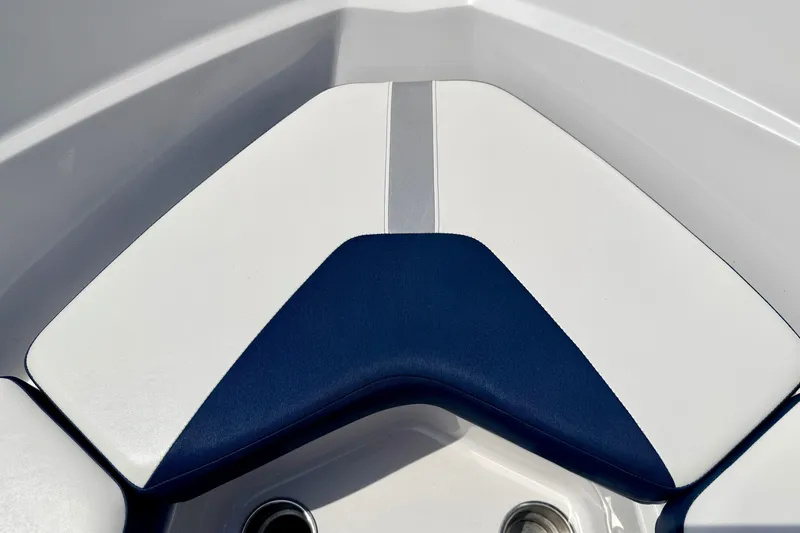 Slide: The Image of 2014 Four Winns H200 boat interior with blue and white seating. - 69
