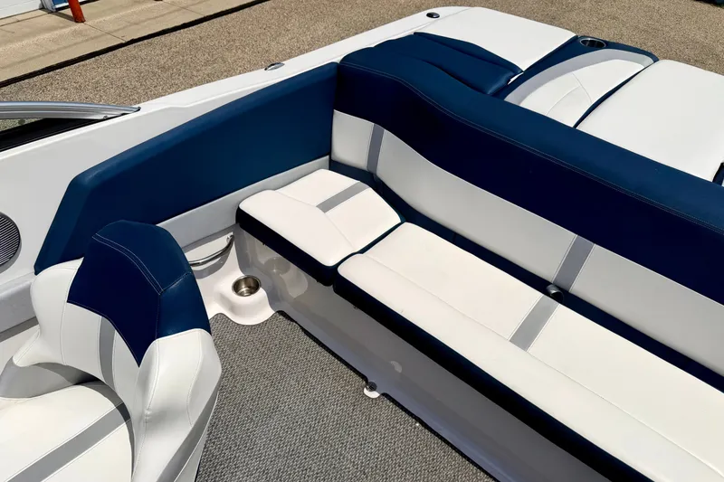 Slide: The Image of Interior of 2014 Four Winns H200 boat with blue and white seating. - 75