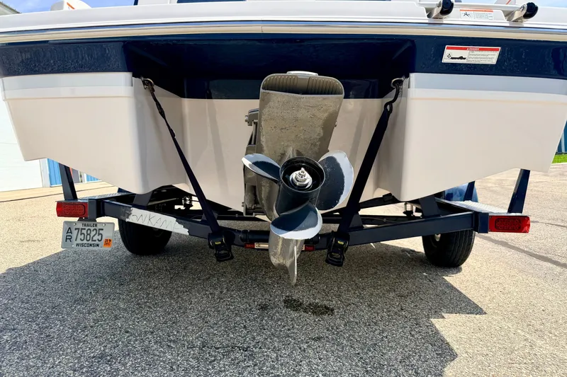 Slide: The Image of Rear view of a 2014 Four Winns H200 boat on a trailer. - 87
