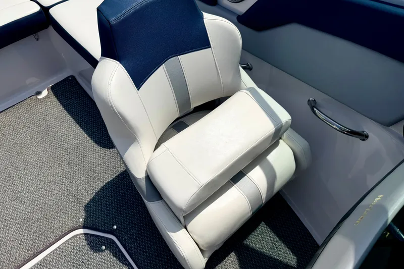 Slide: The Image of 2014 Four Winns H200 boat seat with blue and white upholstery. - 50