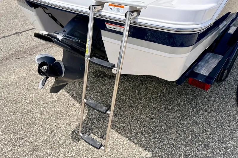 Slide: The Image of Rear view of 2014 Four Winns H200 boat with ladder and propeller. - 27