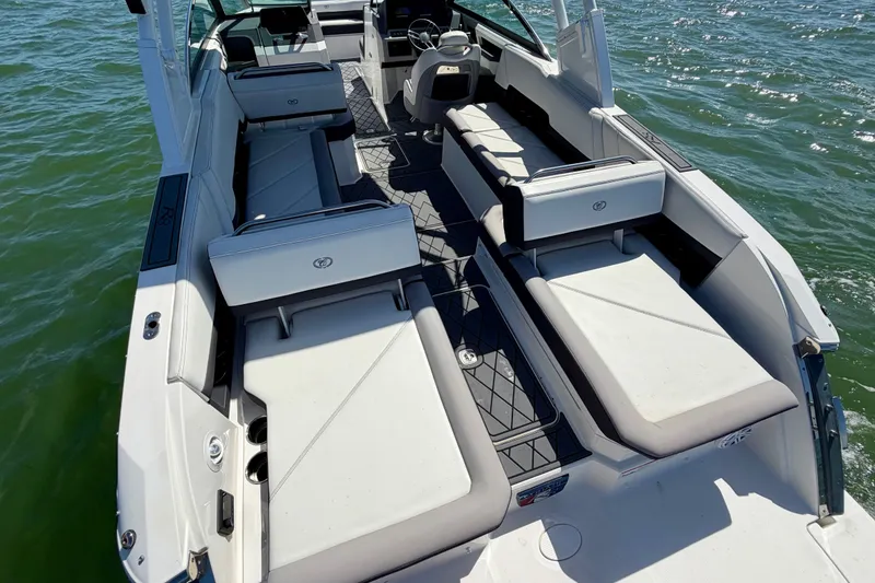 Slide: The Image of 2022 Cobalt R8 Outboard boat interior with spacious seating on the water. - 18