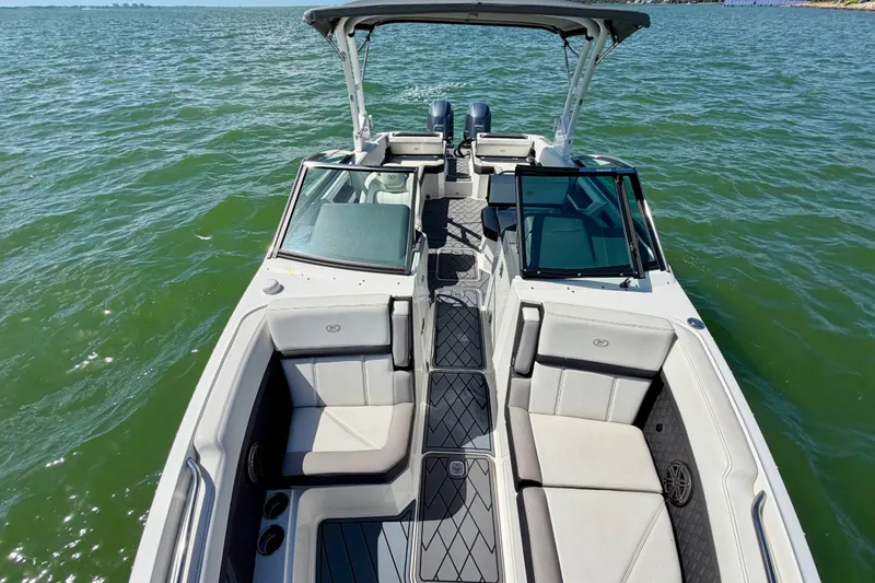 Slide: The Image of 2022 Cobalt R8 Outboard boat on water, featuring spacious seating and sleek design. - 22